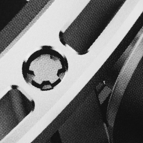 Zoom sur un panneau trapèze Loutan, impression en sérigraphie quadrichromique